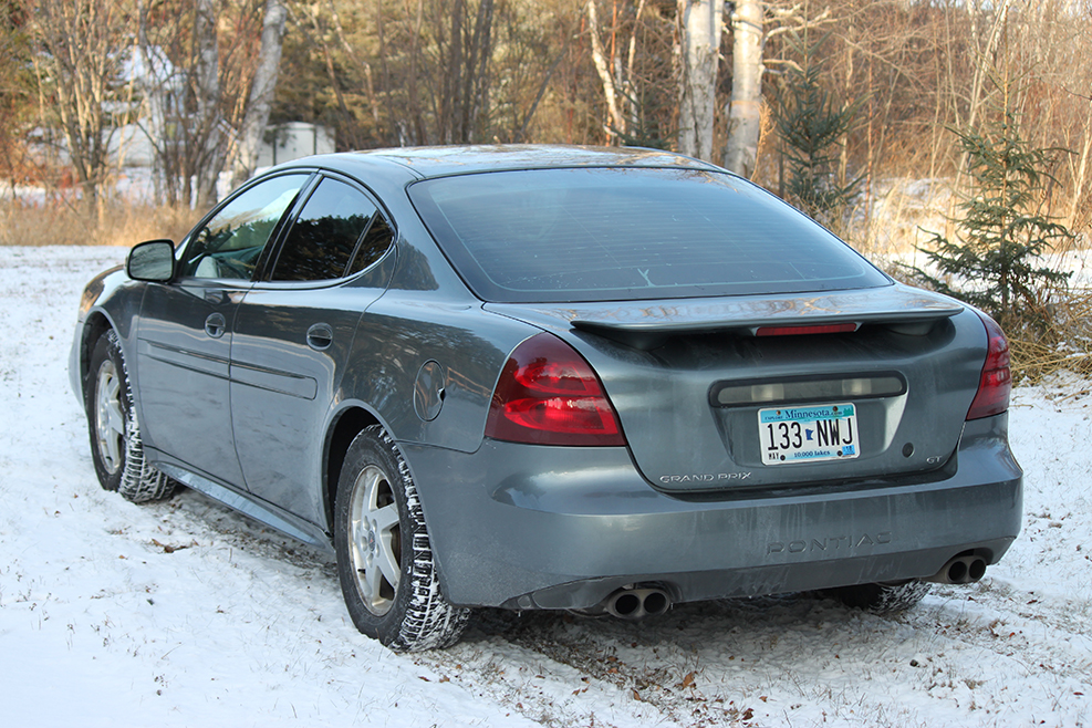 Back side of a car with window tint